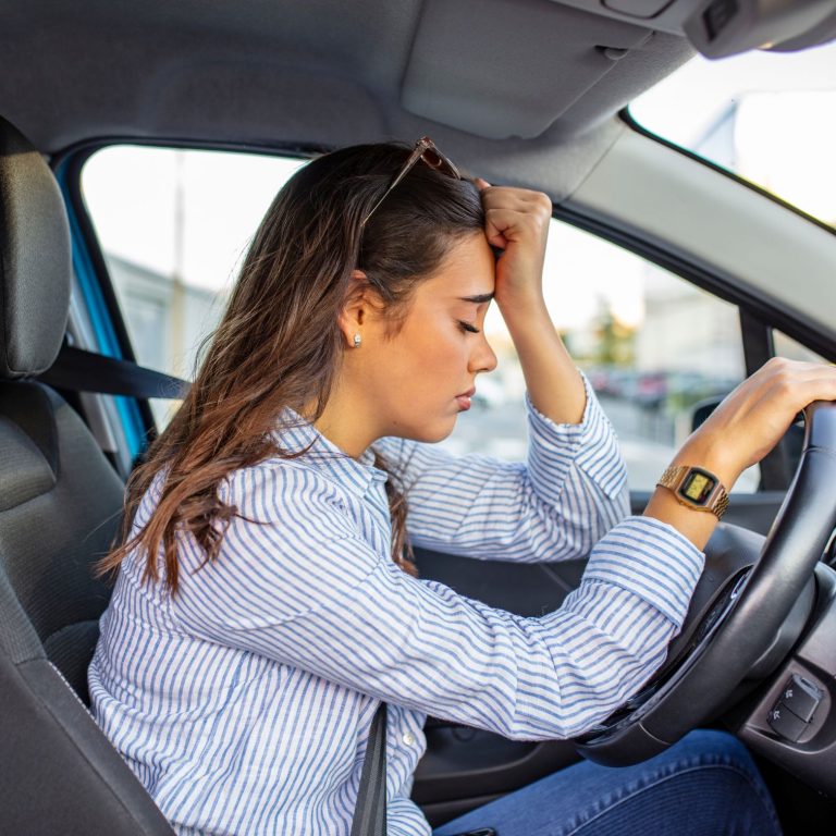 Confused driver thinking of garage repair bill